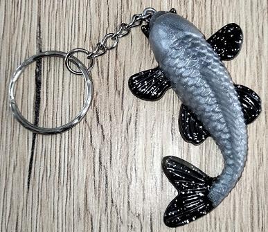 18 pc poisson argent et noir pailltt argent1